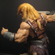 Illustration for article titled Artist builds beautiful He-Man sculpture with biceps the size of honey baked hams